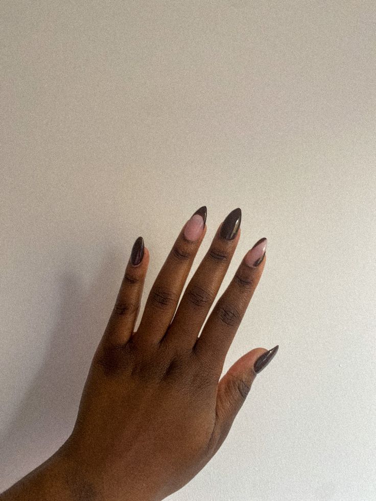 Sophisticated Almond-Shaped Nail Design: Dark Chocolate and Soft Pink Elegance.