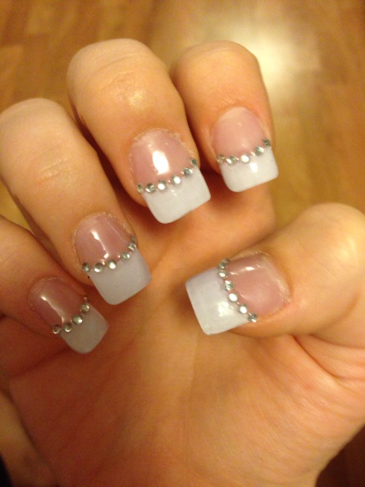 Sophisticated Ombre Nail Design with Soft Blue Tips and Silver Studs