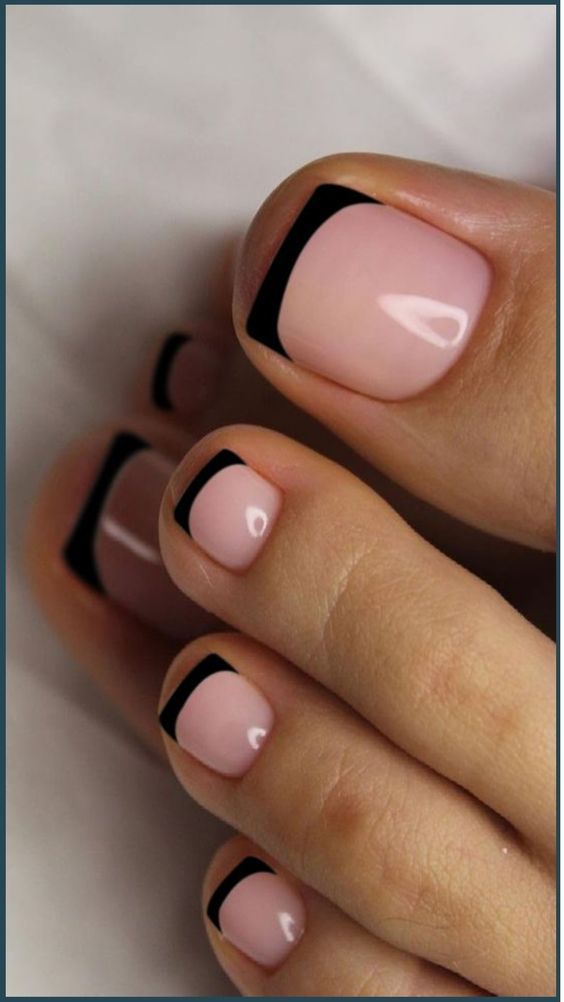 Chic Minimalist Pedicure: Soft Pink Base with Striking Black Tips