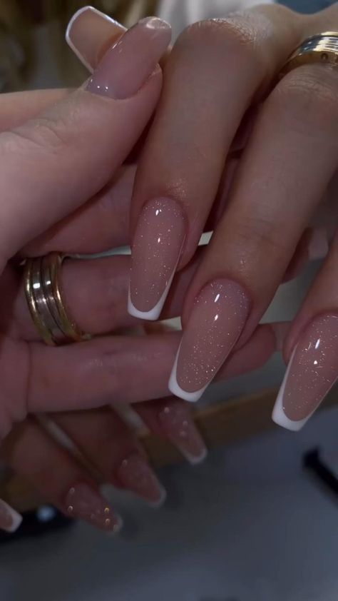 Sophisticated Chic: Elegant Nude Nail Design with Classic French Tips and Subtle Glitter