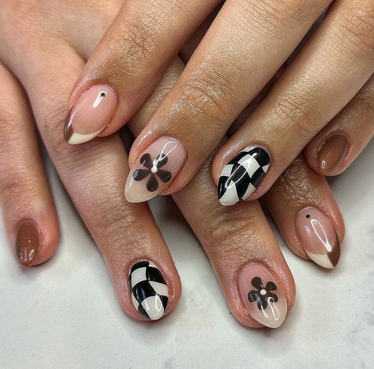 Chic and Playful Nail Designs: A Fusion of Neutral and Bold Colors with Intricate Motifs and Finishes.