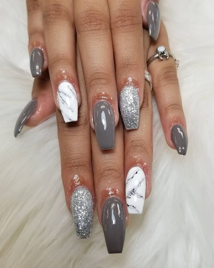 Chic Gray Nail Design with Marble Accents and Glitter Glam