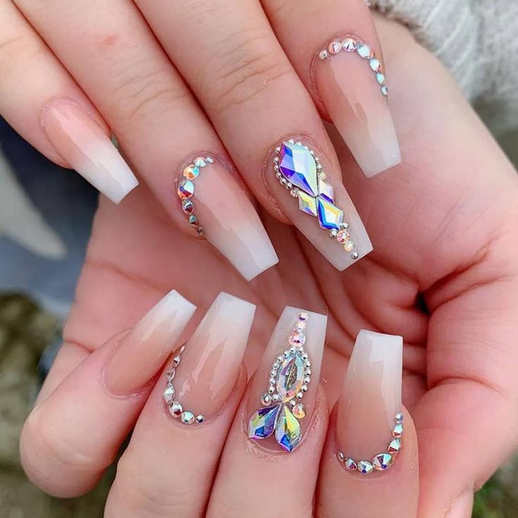 Stunning Ombre Nails with Rhinestone Embellishments for a Glamorous Look.