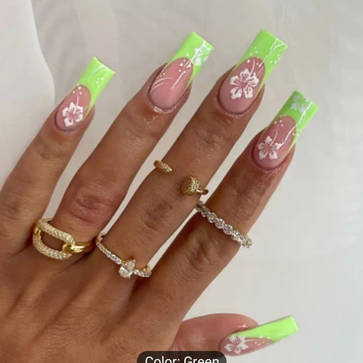 Vibrant Lime Green Gradient Nail Design with Floral Patterns and Gold Accents.