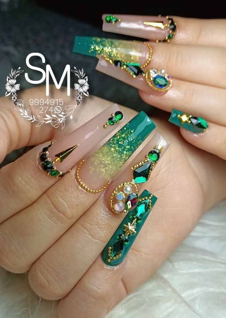 Luxurious Emerald Green and Clear Nail Design with Striking Tips and Intricate Embellishments