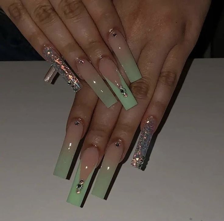 Sophisticated Gradient Nail Design with Elongated Square Tips and Glamorous Embellishments.