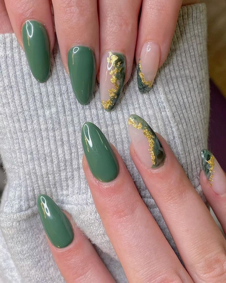 Sophisticated Elegant Nail Design: Rich Green with Gold Accents and Modern Negative Space