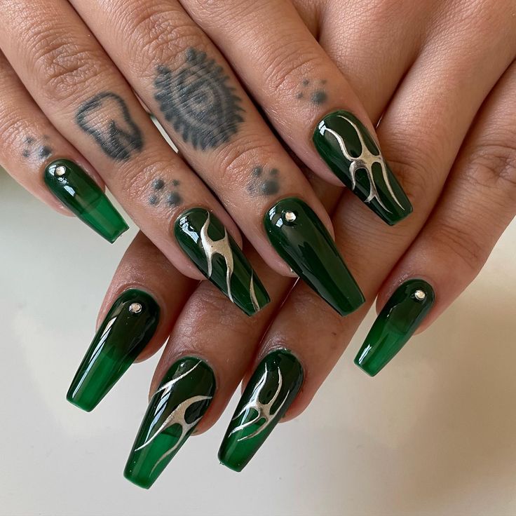 Elegant Green Ombre Nails with Glossy Finish and Silver Flame Designs