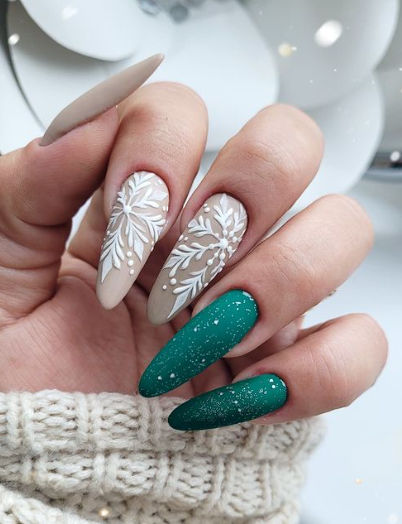 Sophisticated Earthy Nail Design with Floral Accents and Mixed Finishes.