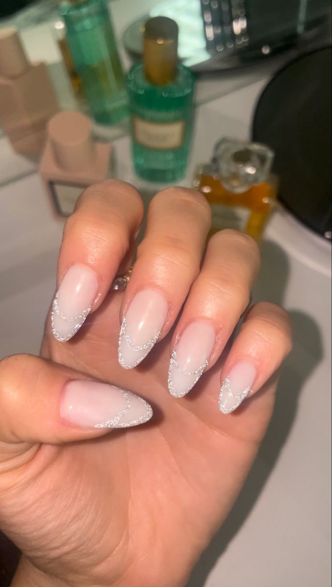 Chic Elegant Nail Design: Soft Nude Base with Glamorous Silver Tips