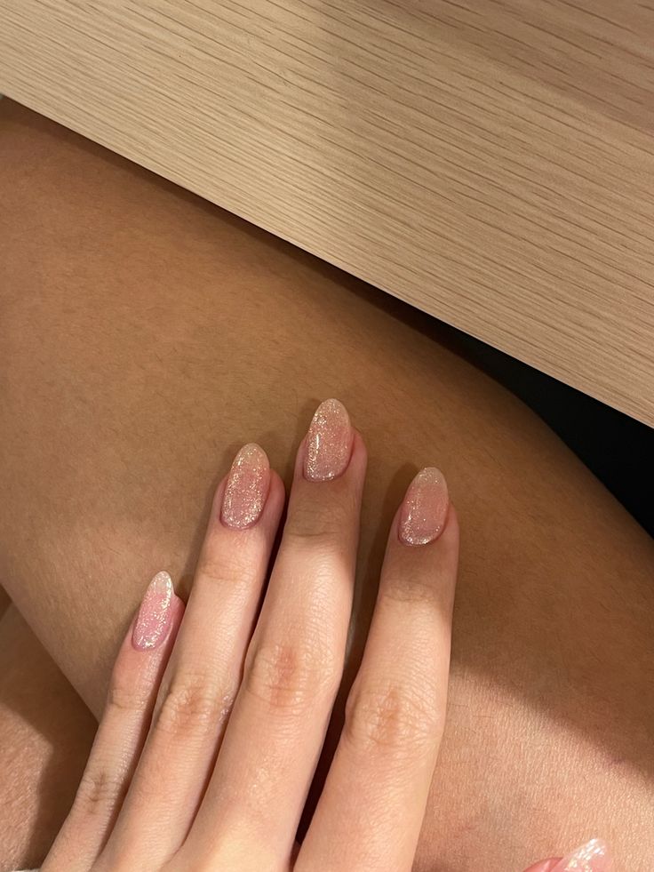 Elegant Tapered Nude Nails with Shimmer: Perfect for Any Occasion