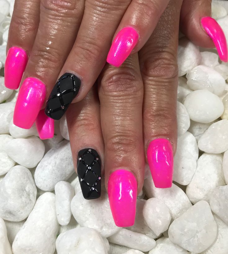 Vibrant Hot Pink Nails with Elegant Black Diamond Accent Design.