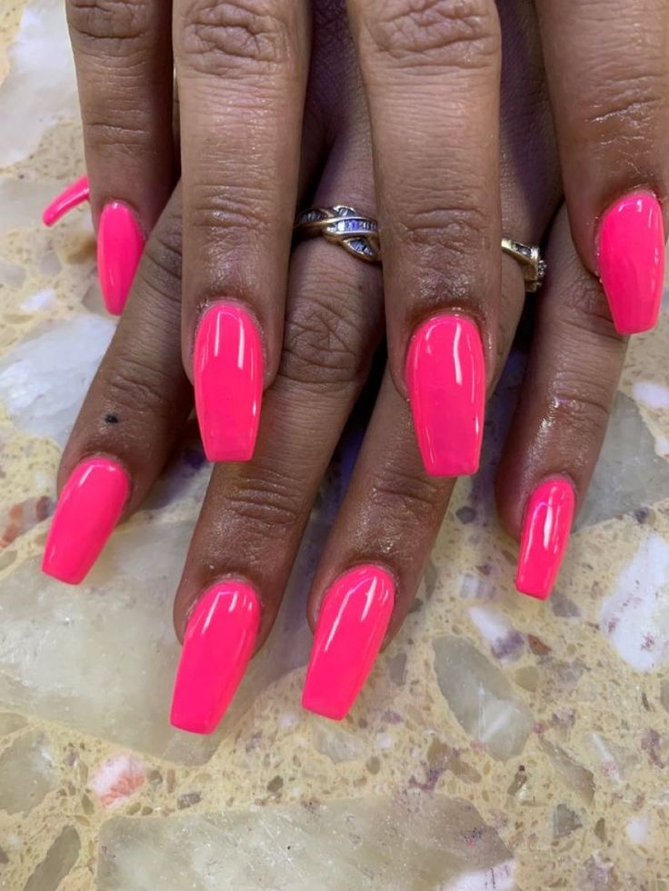 Bold Neon Pink Nails: A Chic Statement for Summer and Festive Occasions