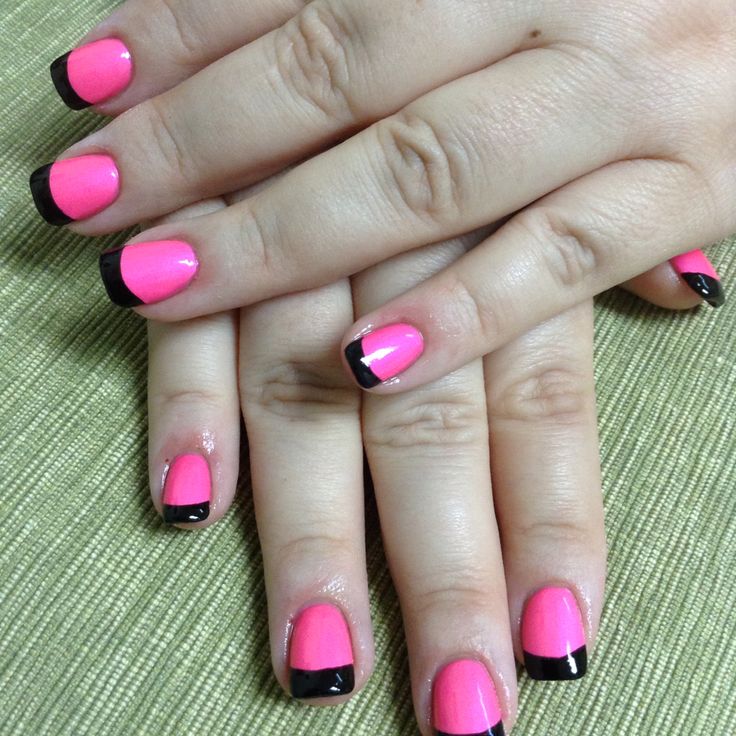 Bold Pink and Black French Tip Manicure: A Modern Twist on Classic Style.