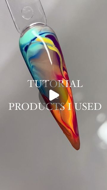 Vibrant Abstract Nail Art: Swirling Tie-Dye Design with Glossy Finish