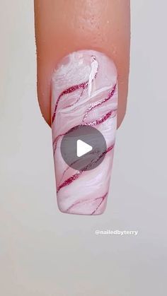 Elegant Marble Nail Design with Soft Whites and Shimmering Pink Swirls.