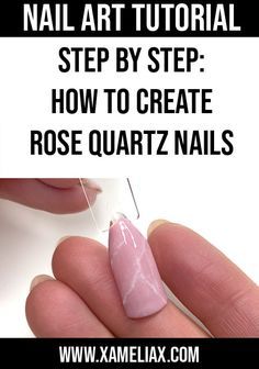 Elegant Rose Quartz Nail Design with Soft Pink Base and White Veining.