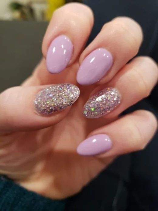 Chic Lavender Nails with Glitter Accents for a Glamorous Look.