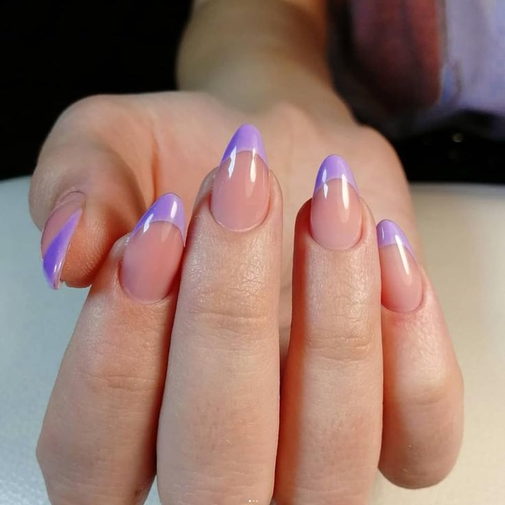 Chic Pastel Purple French Tips: A Playful and Elegant Nail Design.