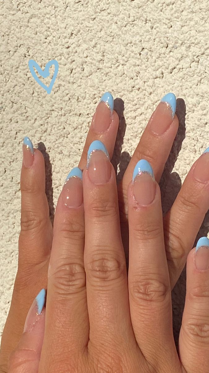 Elegant Pastel Nail Design: Light Blue French Tips with Subtle Sparkles