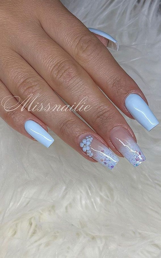 Chic Soft Blue Nail Design: Elegance Meets Playful Sophistication