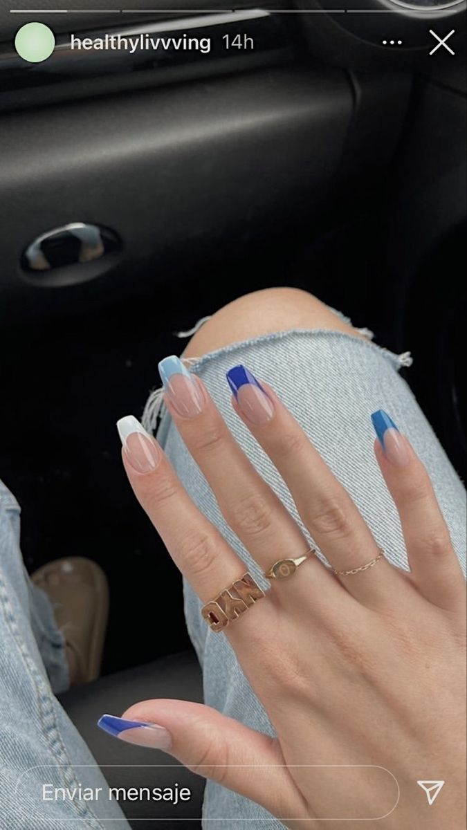 Trendy Nail Design: Bold Blue and White Tips on Natural Bases for a Fresh Look