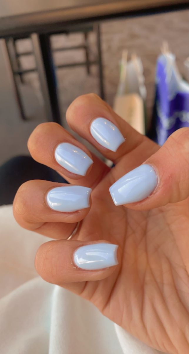 Elegant Soft Blue Manicure with Glossy Finish for Versatile Occasions