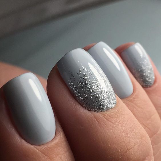 Sophisticated Gray Ombrete Manicure with Sparkling Silver Gradient.