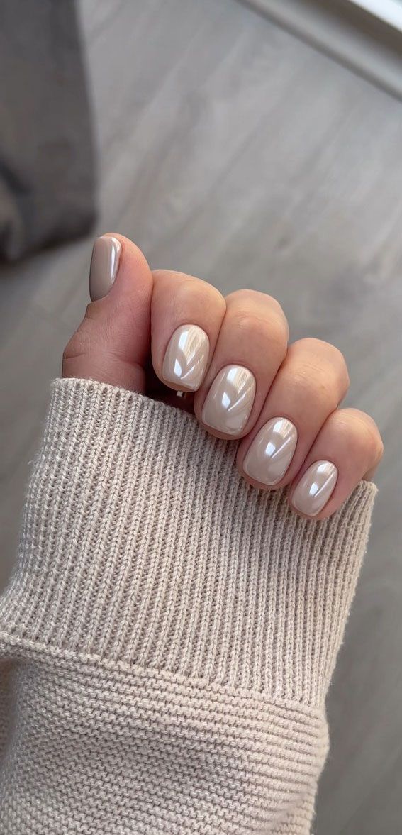 Chic Neutral-Toned Nail Design: Versatile Elegance with a Smooth, Glossy Finish.