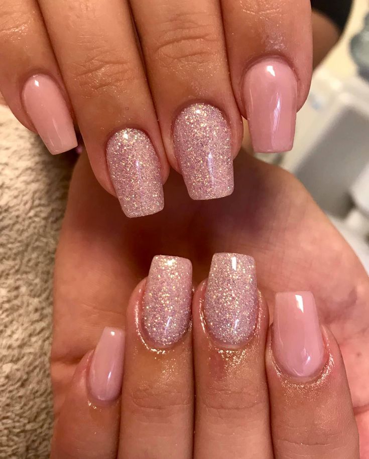 Chic Pink Nail Design with Glitter Accents for a Refined Look.