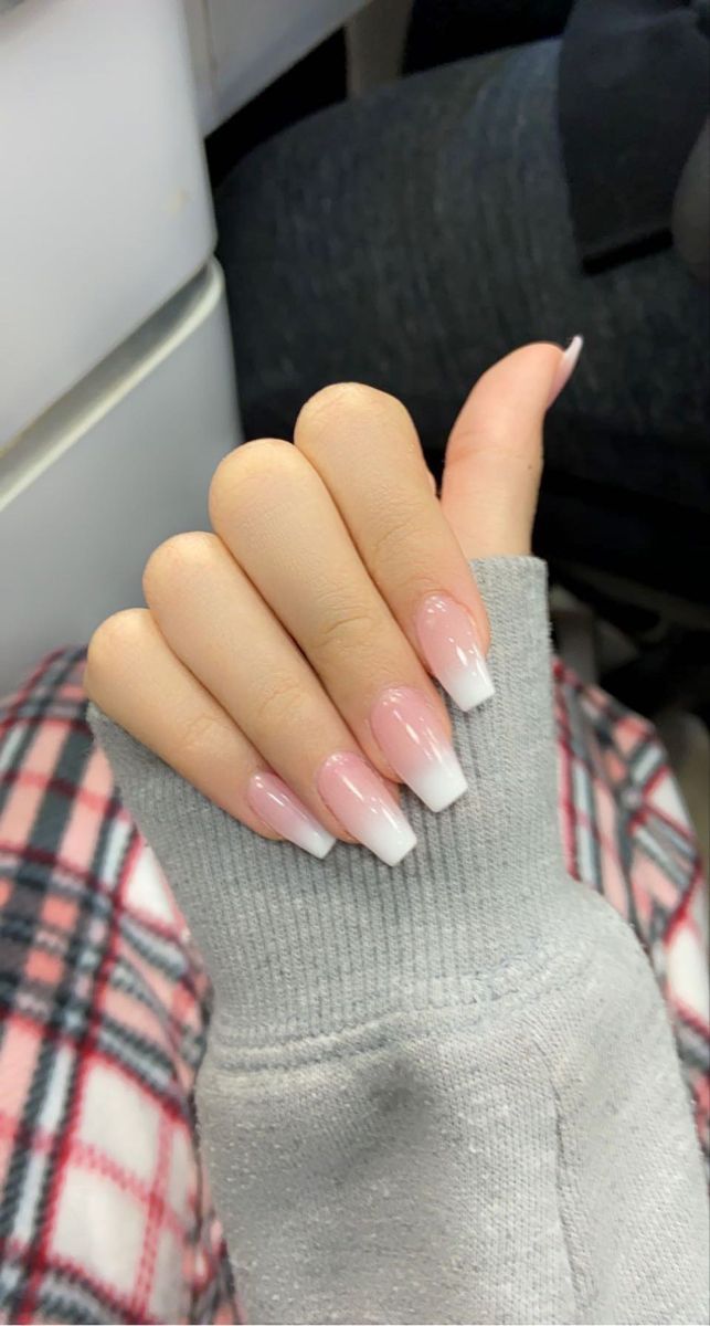 Sophisticated Ombre French Manicure with Glossy Finish on Almond-Shaped Nails.