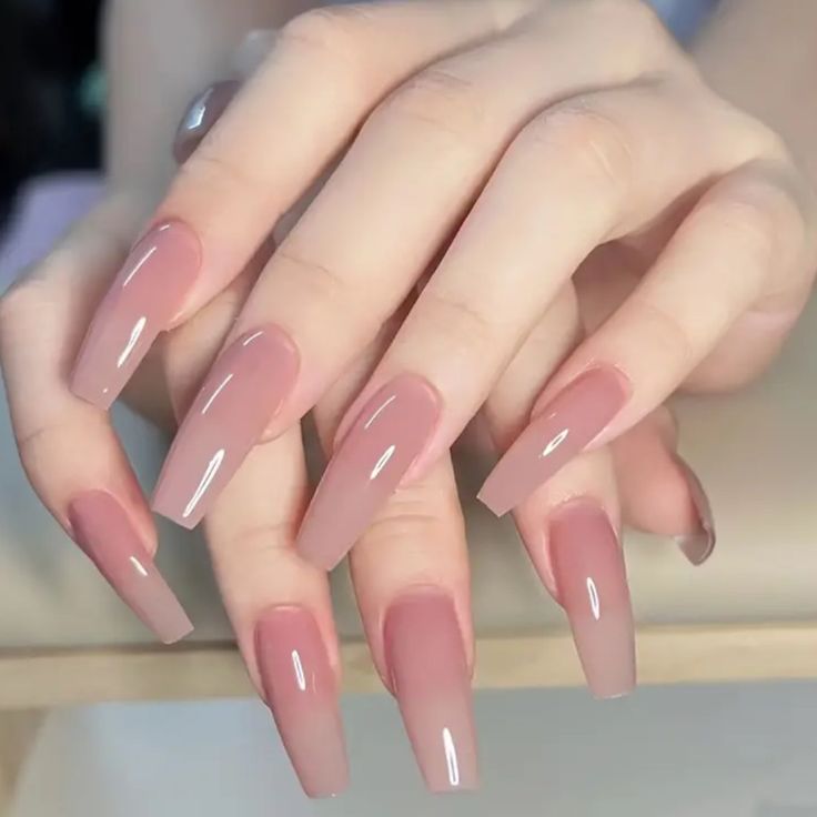 Chic Ombre Nails: Light Pink to Deep Rose with Glossy Finish in Modern Long Square Shape.