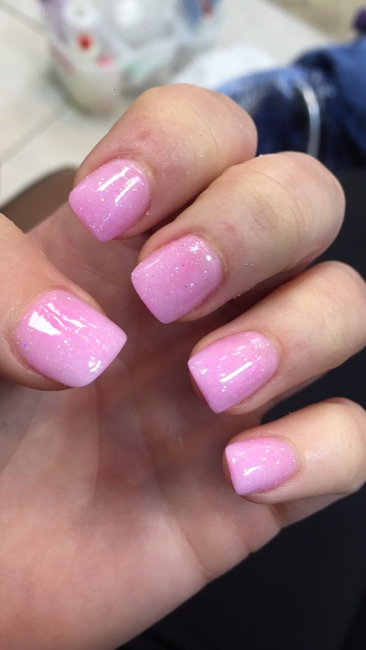 Elegant Gradient Glossy Pink Nails: A Soft Feminine Look for Any Occasion.