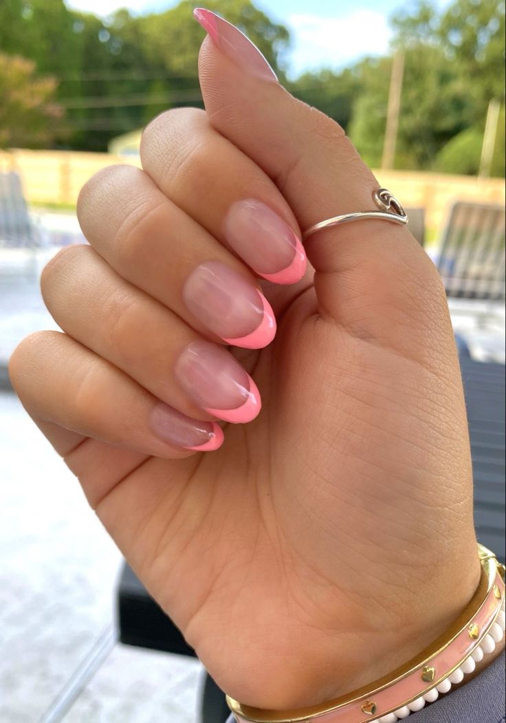 Chic Ombre Nail Design: A Modern Twist on French Manicure with Vibrant Pink Tips.