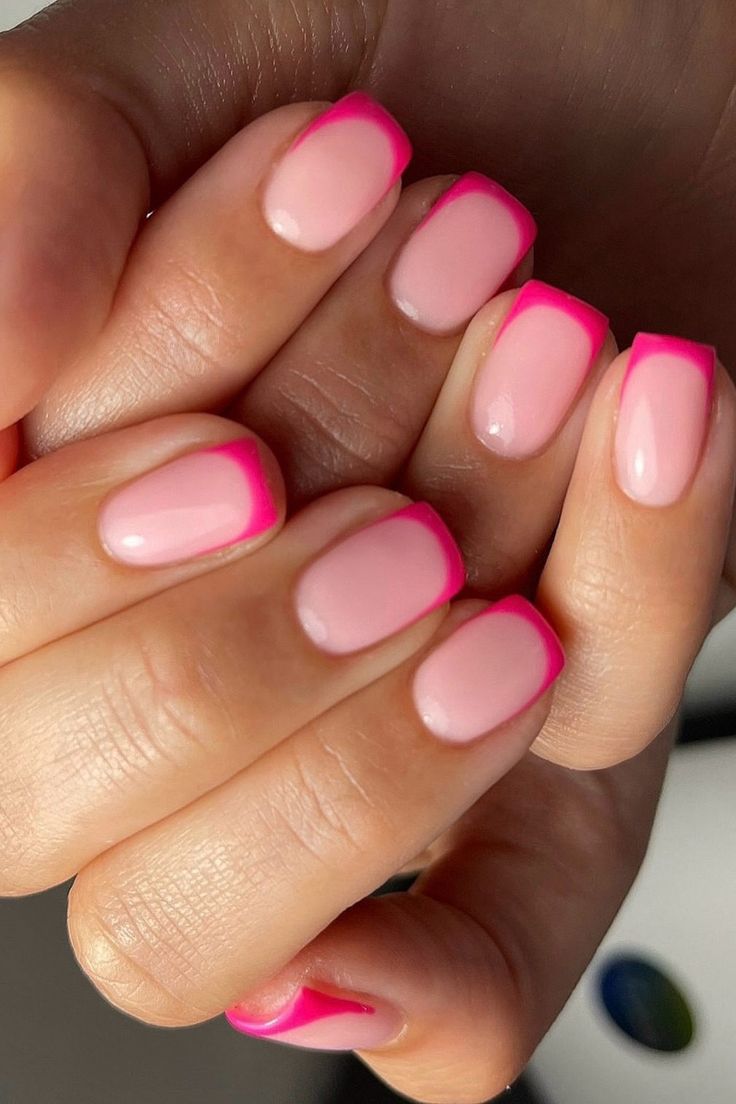 Vibrant Neon and Soft Pink Classic French Tip Manicure with Chic Geometric Design.