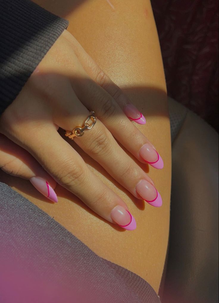 Elegant Soft Pink Nail Design with Vibrant Tips and Delicate Accessories