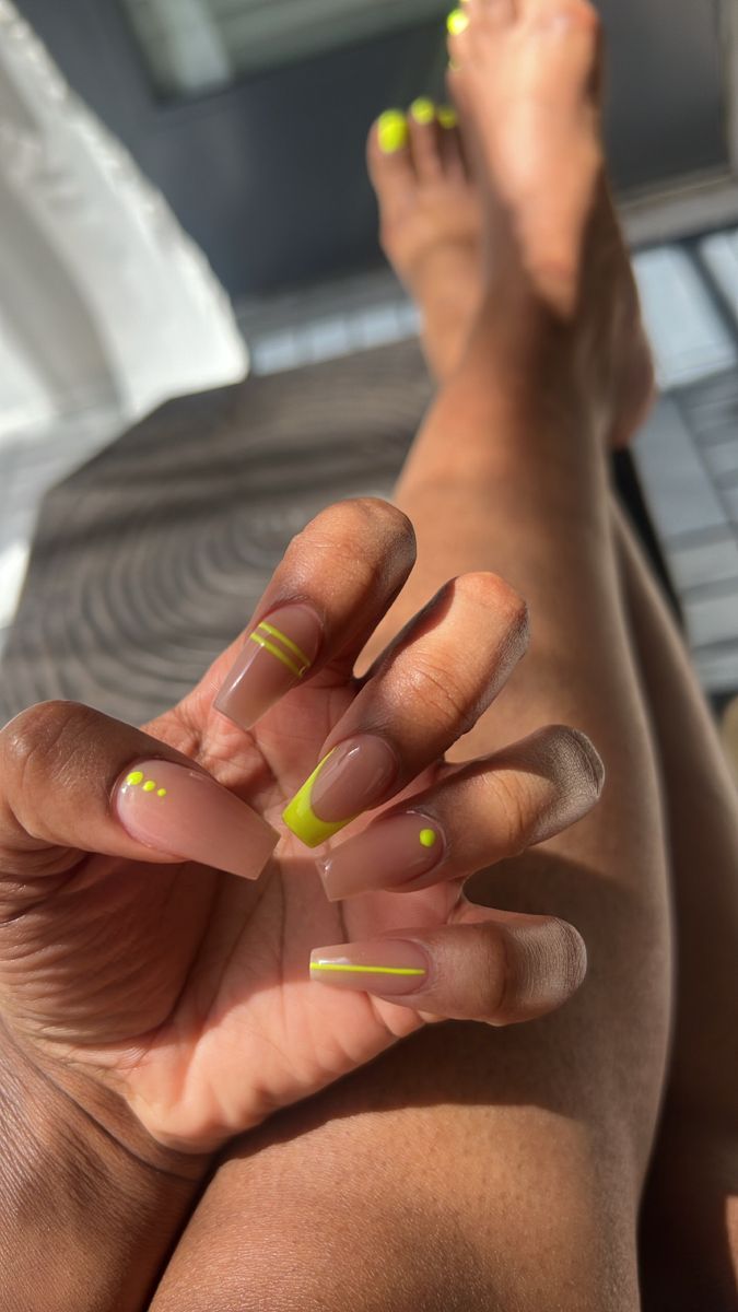 Vibrant Neon Green Accents Elevate Minimalistic Nude Nail Design.