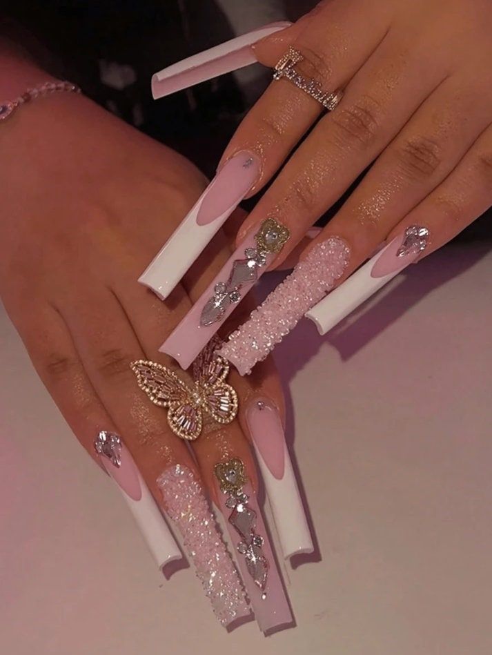 Glamorous Pastel Pink and White Long Nail Design with Sparkling Butterfly Accents