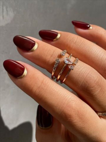 Chic Gold-Tipped Burgundy Nails: A Perfect Blend of Modern Style and Classic Allure.