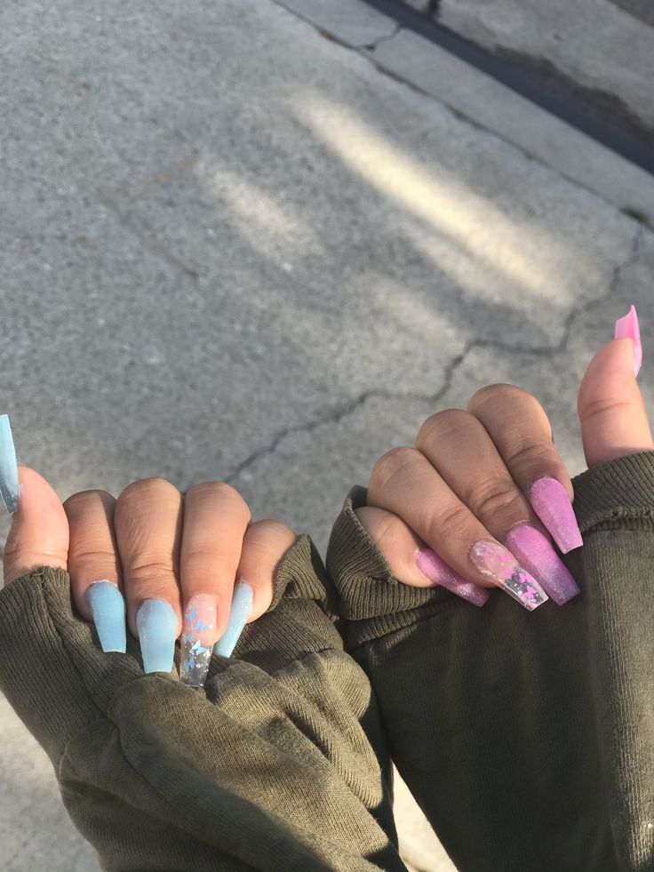 Chic Pastel Nail Designs: A Playful Yet Sophisticated Blend of Baby Blue and Soft Pink.