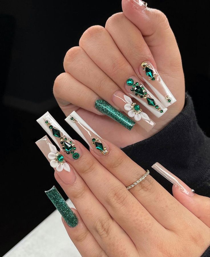 Elegant Stiletto Nail Design with Vivid Green Accents and Floral Details.