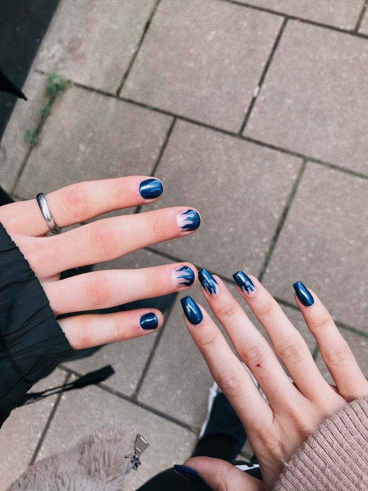 Bold Dark Blue Gradient Nail Design with Artistic Detailing