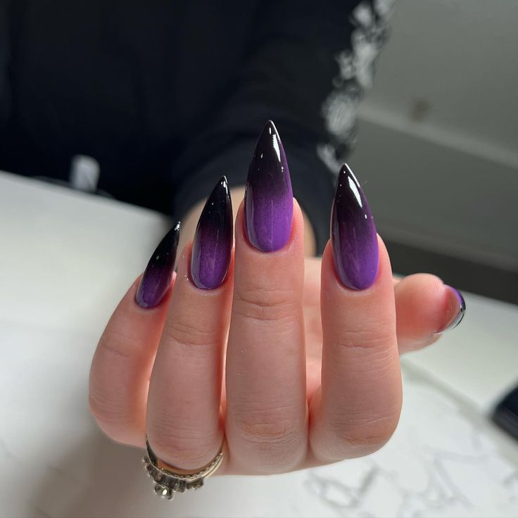 Elegant Ombre Stiletto Nails: Deep Purple Gradients for a Striking Sophisticated Look.