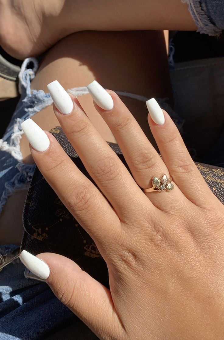 Chic Minimalist White Square Nails with Gold Accent for a Modern Look.