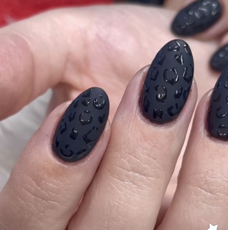 Bold Matte Black Leopard Print Nails: A Chic and Edgy Statement.