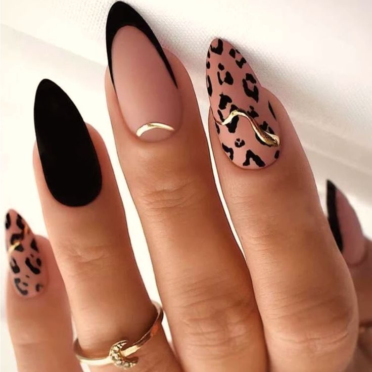 Chic Matte Black and Nude Almond-Shaped Nails with Leopard Print and Gold Accents.