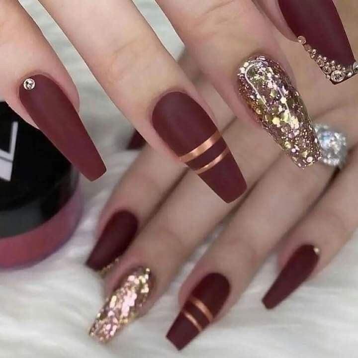 Sophisticated Elegant Burgundy Nail Design with Matte and Glitter Finish Accents.