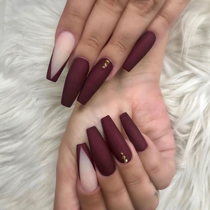 Sophisticated Matte Burgundy Nails with Unique Art and Gold Accents