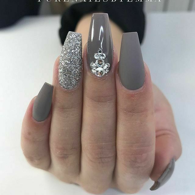 Sophisticated Matte and Glitter Nail Design with Gray and Silver Accents.