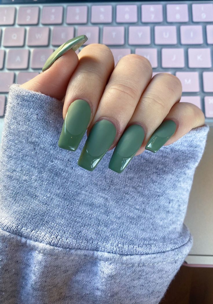 Sophisticated Matte Green Nails with Glossy Tips for a Trendy Chic Look.